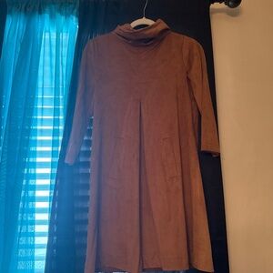 Tyler Boe tan dress.